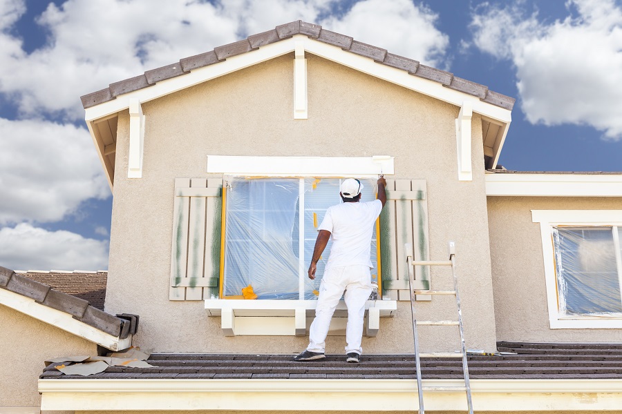 Busy,House,Painter,Painting,The,Trim,And,Shutters,Of,A