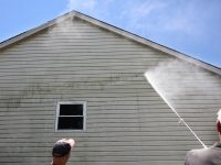 Mold,Is,Cleaned,From,A,House,Using,A,Power,Washer.